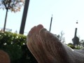 Mistress legs in white tights outdoor