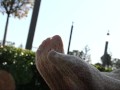 Mistress legs in white tights outdoor