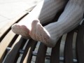 Mistress legs in white tights outdoor