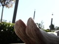 Mistress legs in white tights outdoor
