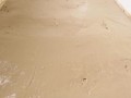 BBW Penny touching herself in a bath full of muddy clay