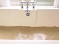 BBW Penny touching herself in a bath full of muddy clay