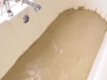 BBW Penny touching herself in a bath full of muddy clay