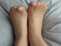 CUTE FEET IN NYLONS TAKE A LOAD OF CUM