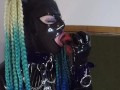 Miss Maskerade Latex doll blowjob dildo in full rubber and hood.