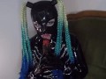 Miss Maskerade Latex doll blowjob dildo in full rubber and hood.