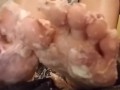 University student steps on cake,  food bashing with feet