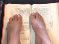 Sexy Feet Reading a Book on a Rainy Day