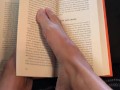 Sexy Feet Reading a Book on a Rainy Day