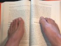 Sexy Feet Reading a Book on a Rainy Day