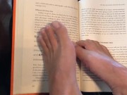 Sexy Feet Reading a Book on a Rainy Day