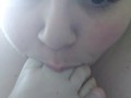 Brunette Beauty Sucks Her Own Toes