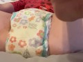 Diaper girl soaks goodnite and wets the bed while masturbating