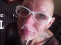 Masked slut smokes a cigarette and gets jerked off onto her face