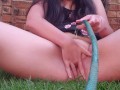 Teen masturbating with hosepipe
