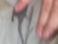 Milf pissing in  her grey shorts 