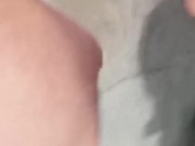 Milf pissing in  her grey shorts 