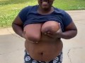Showing my big tits in the front yard