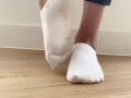 Tanned girl in white socks cute feet