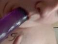 Me sucking on a purple jelly dildo then fucking myself~