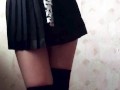 Dancing schoolgirl with beautiful legs and big ass