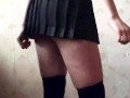 Dancing schoolgirl with beautiful legs and big ass