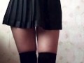 Dancing schoolgirl with beautiful legs and big ass