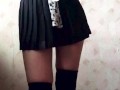 Dancing schoolgirl with beautiful legs and big ass