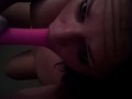 Horny slut deep throats her vibrator