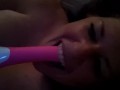 Horny slut deep throats her vibrator