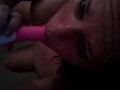 Horny slut deep throats her vibrator