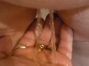 My wife pissing on my hand