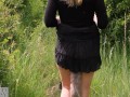 Woman in the Woods takes a foxtail butt plug in her ass, public outdoor