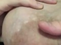 Hand expressing my breastmilk 