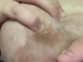 Hand expressing my breastmilk 