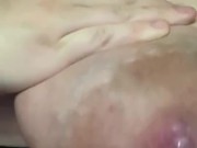 Hand expressing my breastmilk 
