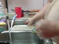 A man doing the dishes!!!   PT. 1