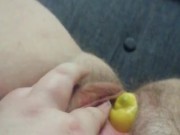 Stuffing my pussy with a lemon