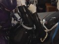 Miss Maskerade Latex couple with fucking machine in full rubber and bondage