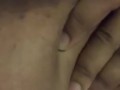 Ebony black girl sucking her own huge boobs