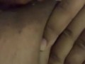 Ebony black girl sucking her own huge boobs