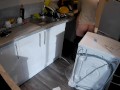 Horny wife seduces plumber in the kitchen while husband at work
