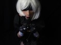 Silicone doll with 2B cosplay gives blowjob to strapon