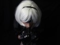Silicone doll with 2B cosplay gives blowjob to strapon
