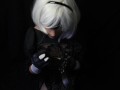 Silicone doll with 2B cosplay gives blowjob to strapon
