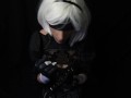 Silicone doll with 2B cosplay gives blowjob to strapon