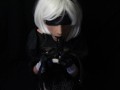 Silicone doll with 2B cosplay gives blowjob to strapon