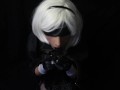 Silicone doll with 2B cosplay gives blowjob to strapon