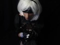 Silicone doll with 2B cosplay gives blowjob to strapon