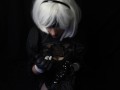 Silicone doll with 2B cosplay gives blowjob to strapon